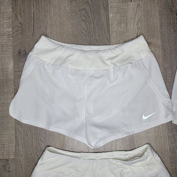 Nike dri fit white running shorts set of 4. pocket on back with lining size Larg - Picture 10 of 13